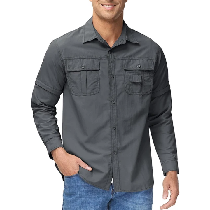 Man hiking in a sun protective, quick-dry men's zip-off outdoor shirt. Ideal versatile adventure clothing.