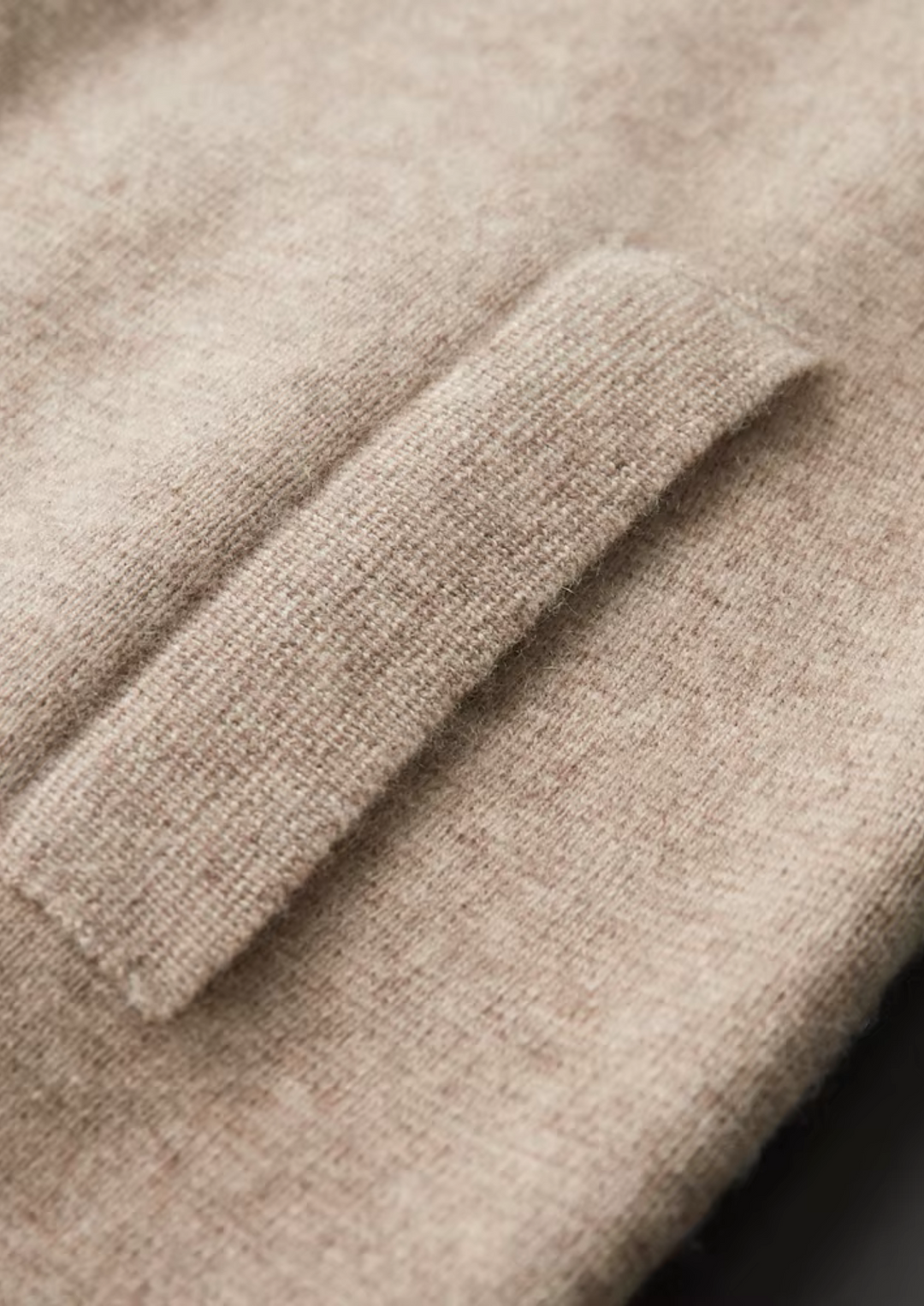 Comfortable men's zip-up cardigan sweater. Essential for versatile all-season layering.