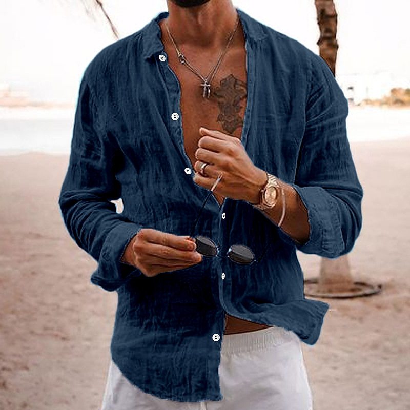 Close-up of the breathable fabric of a mens cotton long-sleeve summer shirt, highlighting its lightweight texture.