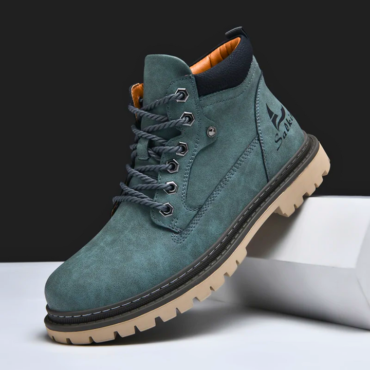 Top-down view of mens all-terrain boots, highlighting sturdy design & durable materials for outdoor use.