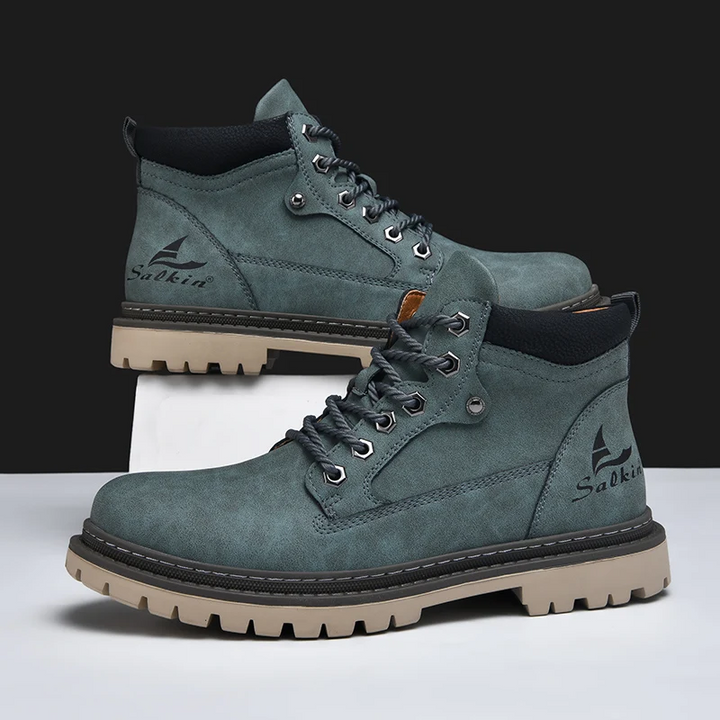 Back view of mens adventure boots, showing ankle support & rugged construction for all-terrain stability.