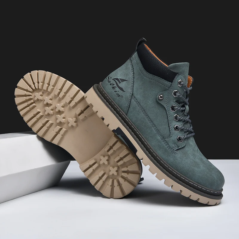 Close-up on the robust stitching of mens durable boots, built for rugged outdoor and urban adventures.