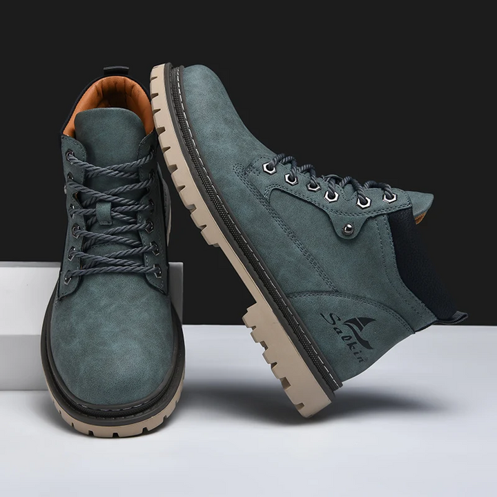 Mens comfortable boots for all-terrain exploration. Rugged design provides traction & support for hiking.
