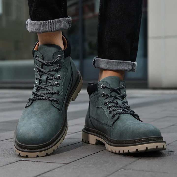 Footwear for men: rugged all-terrain boots, blending urban style with adventure-ready durability.
