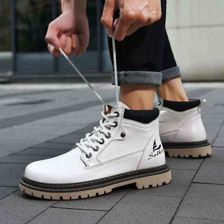 Mens urban style boots with rugged features, suitable for casual wear and all-terrain outdoor adventures.