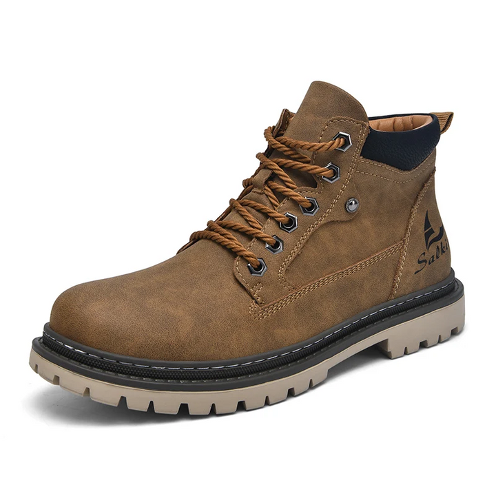 High-angle view of mens durable all-terrain boots, showcasing robust design for hiking and rugged trails.