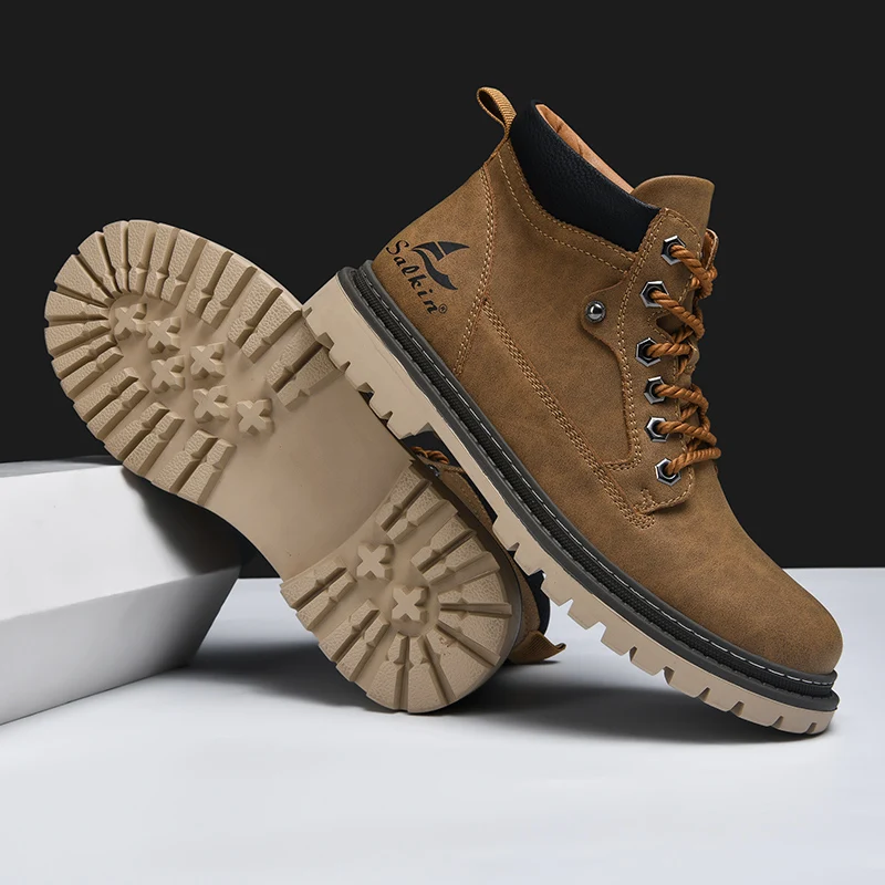 Side profile of mens casual boots, showcasing rugged construction. Comfortable all-terrain footwear for men.