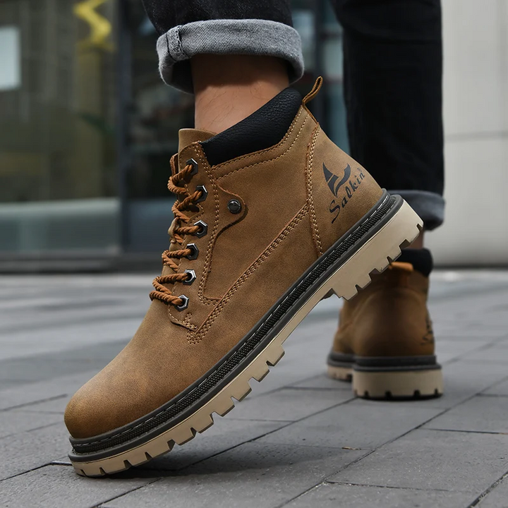 Close-up of the durable sole on mens all-terrain boots, designed for superior traction & outdoor adventure.