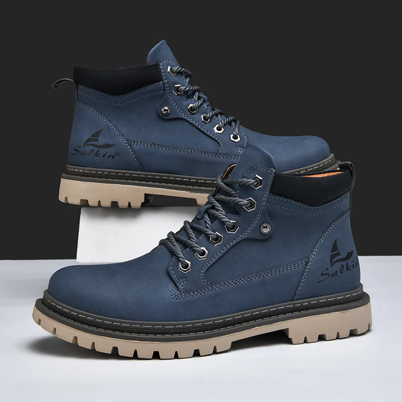 Pair of mens rugged hiking boots for all-terrain adventure. Durable, comfortable & stylish urban footwear.