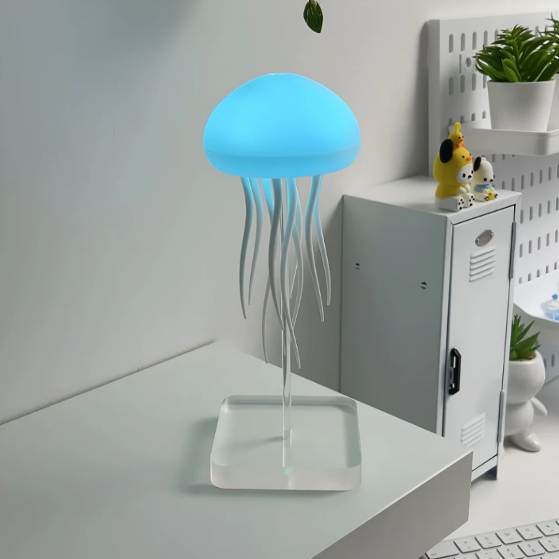 Jellyfish aquarium mood lamp casting calming ambient light, ideal for relaxation in a bedroom or living room.
