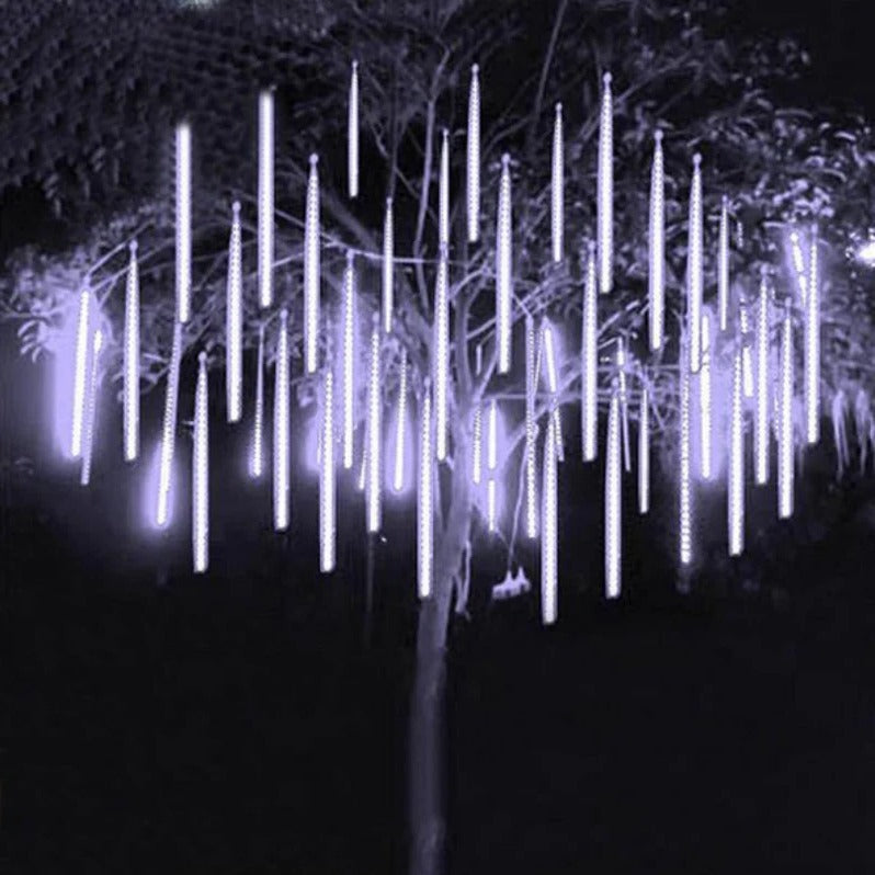 Beautiful cascading snowfall LED lights creating a magical winter wonderland. Perfect for indoor/outdoor Christmas decor.