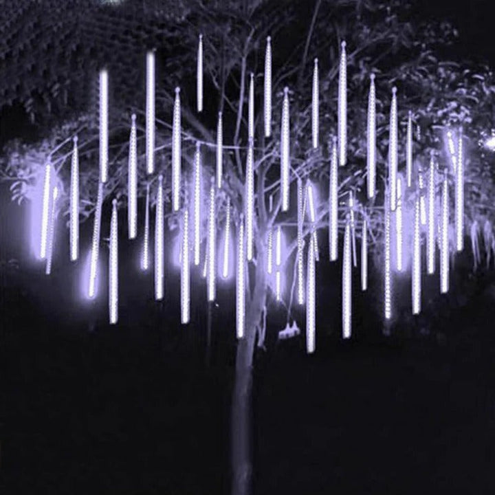 Beautiful cascading snowfall LED lights creating a magical winter wonderland. Perfect for indoor/outdoor Christmas decor.