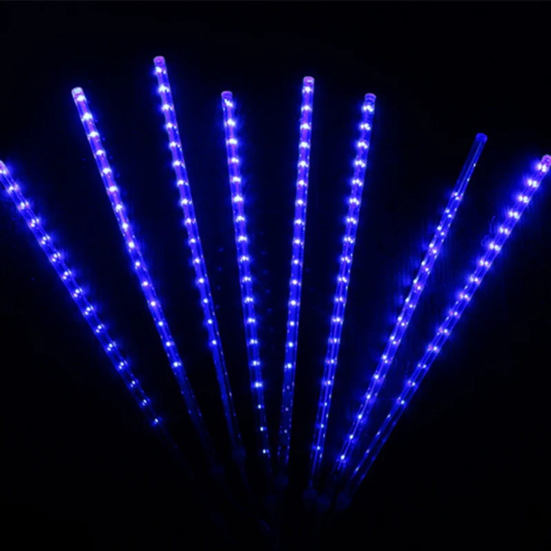 Magical LED snowfall lights for indoor and outdoor holiday decor. Create a festive Christmas atmosphere with cascading lights.