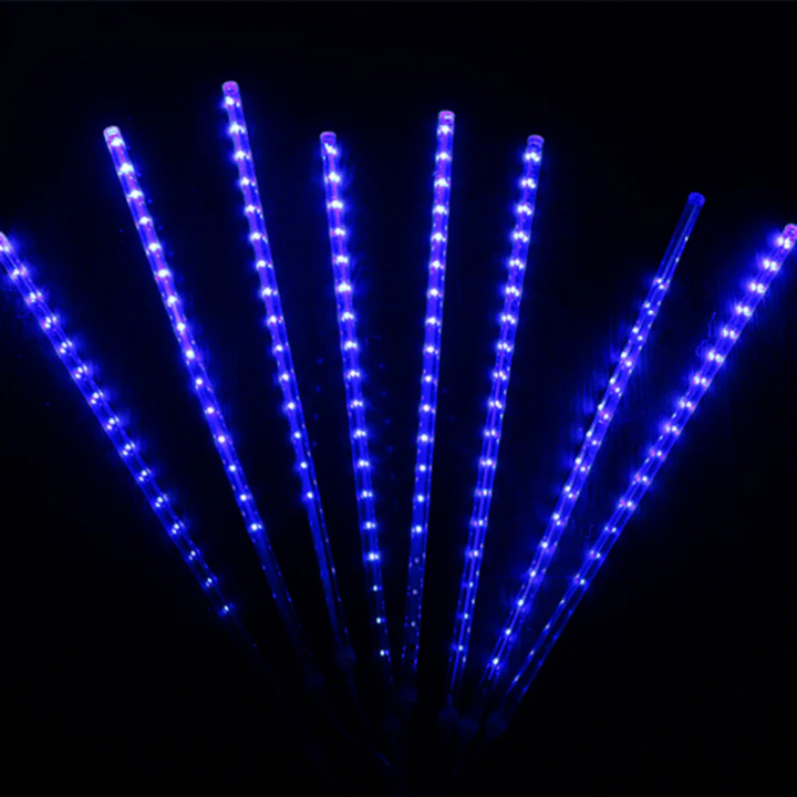 Magical LED snowfall lights for indoor and outdoor holiday decor. Create a festive Christmas atmosphere with cascading lights.