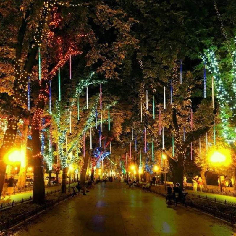 Dynamic LED snowfall lights, perfect for festive winter & Christmas decor. Creates a magical cascading light effect indoors/outdoors.