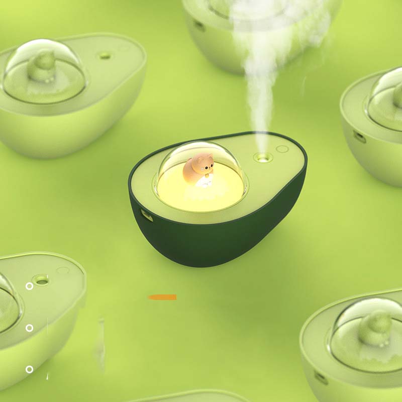 Cute avocado mini humidifier, AvoMist, for desktop decor. USB-powered, quiet, portable for home or office.