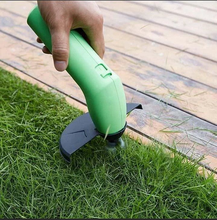 Handheld mini cordless grass cutter, perfect for detailed yard work. Portable electric trimmer for garden tools.