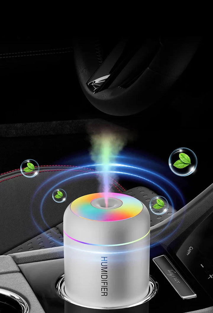 White compact USB humidifier & aromatherapy diffuser showcasing LED light, for car/office