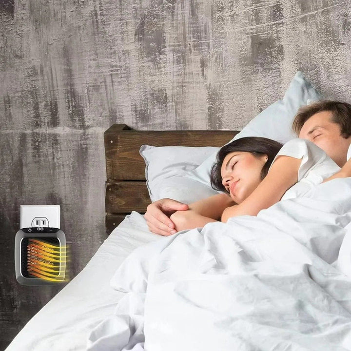 Compact, energy-efficient mini electric space heater. Plugs into wall, perfect for personal warmth.