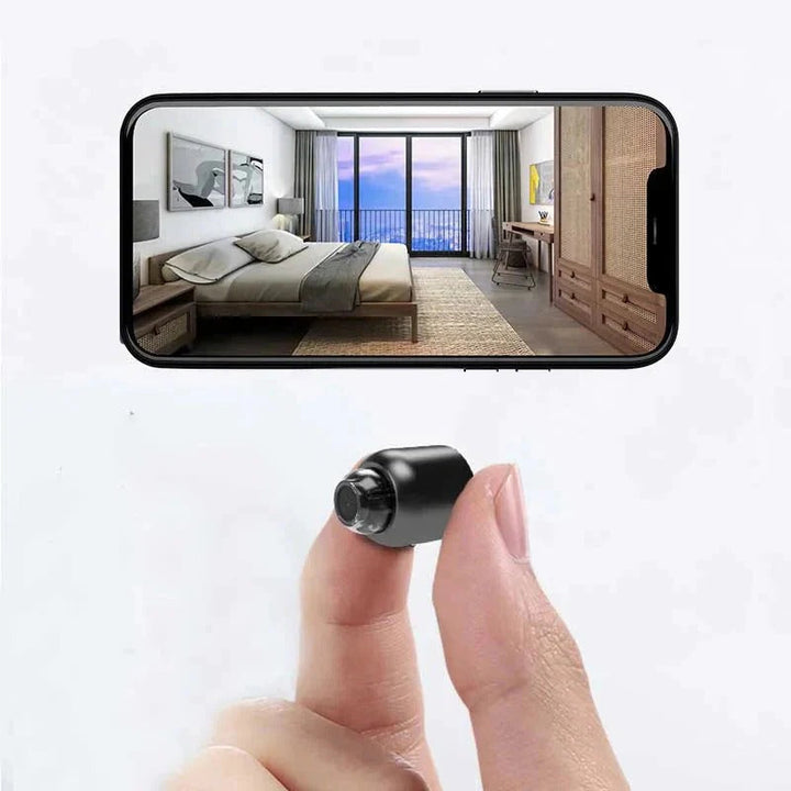 Mini WiFi security camera with enhanced night vision for discreet home surveillance.