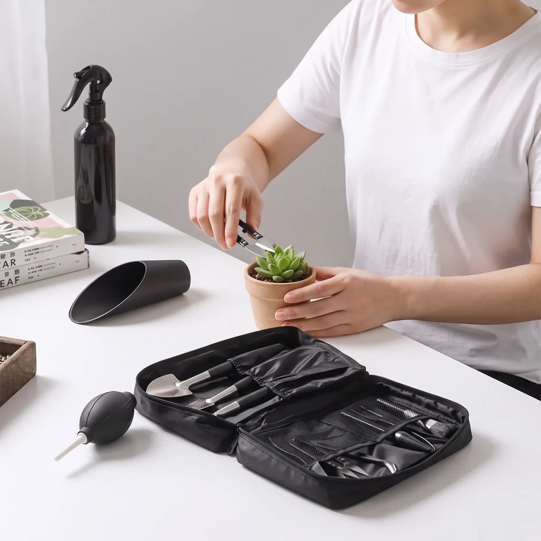 Unisex indoor gardening kit with miniature tools for plant care accessories.