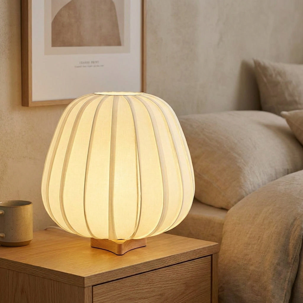 Minimalist AmbiNook table lamp with bamboo base and warm fabric shade, perfect for bedroom decor