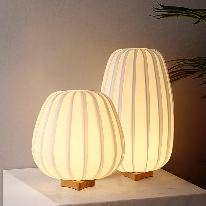 Stylish AmbiNook minimalist table lamp, a elegant home decor piece providing warm ambient lighting