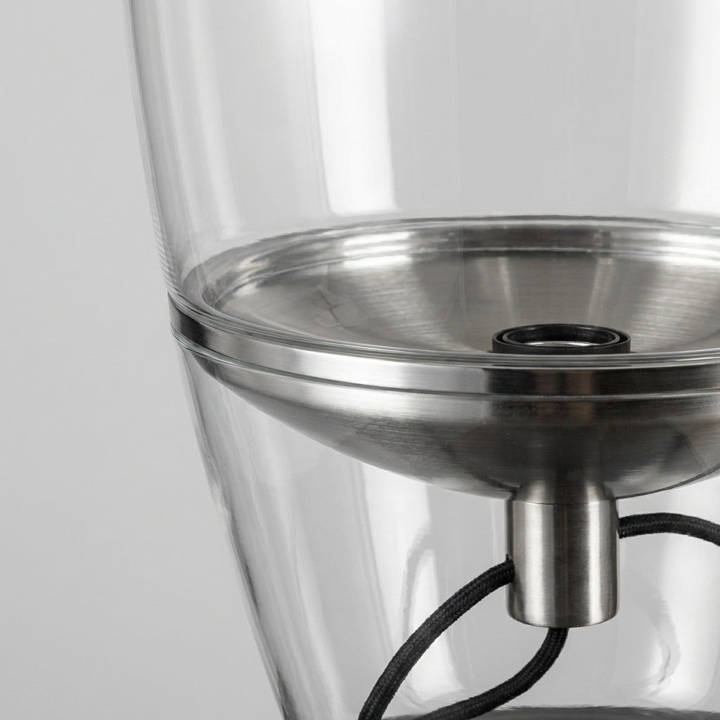 Elegant clear glass Nordella table lamp, perfect as a minimalist bedroom LED light.