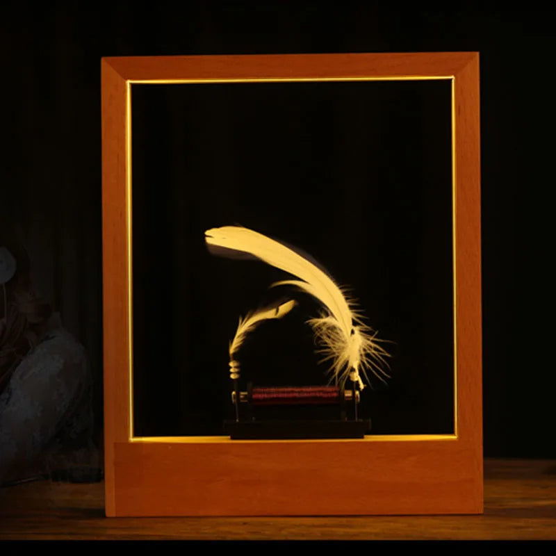 Modern minimalist feather lamp, a home accent piece with gentle, slow motion lighting effect