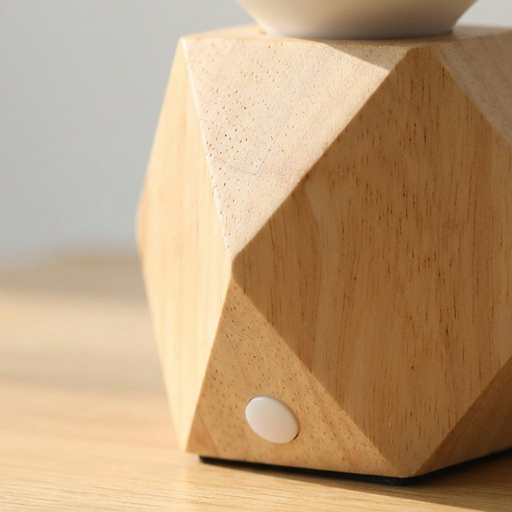 Minimalist Geometric Bedside Table Lamp with unique angular base, perfect for modern bedroom decor.