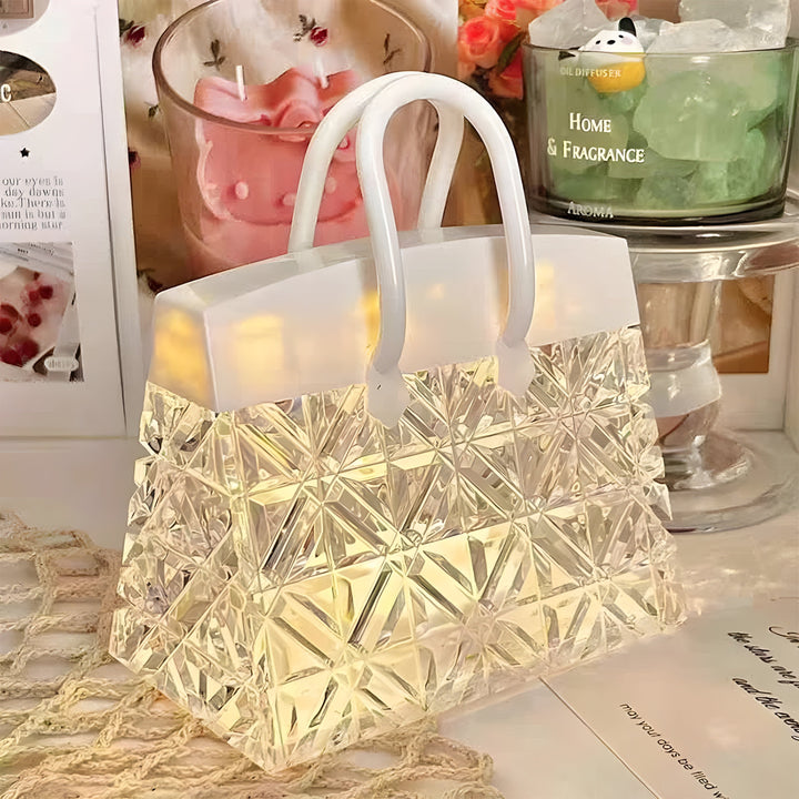 Stylish handbag-inspired decorative table lamp, offering soft LED mood lighting for contemporary homes