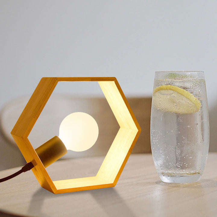 Geometric hexagon wood lamp from Aurexen line, offering subtle ambient light and a sleek minimalist aesthetic