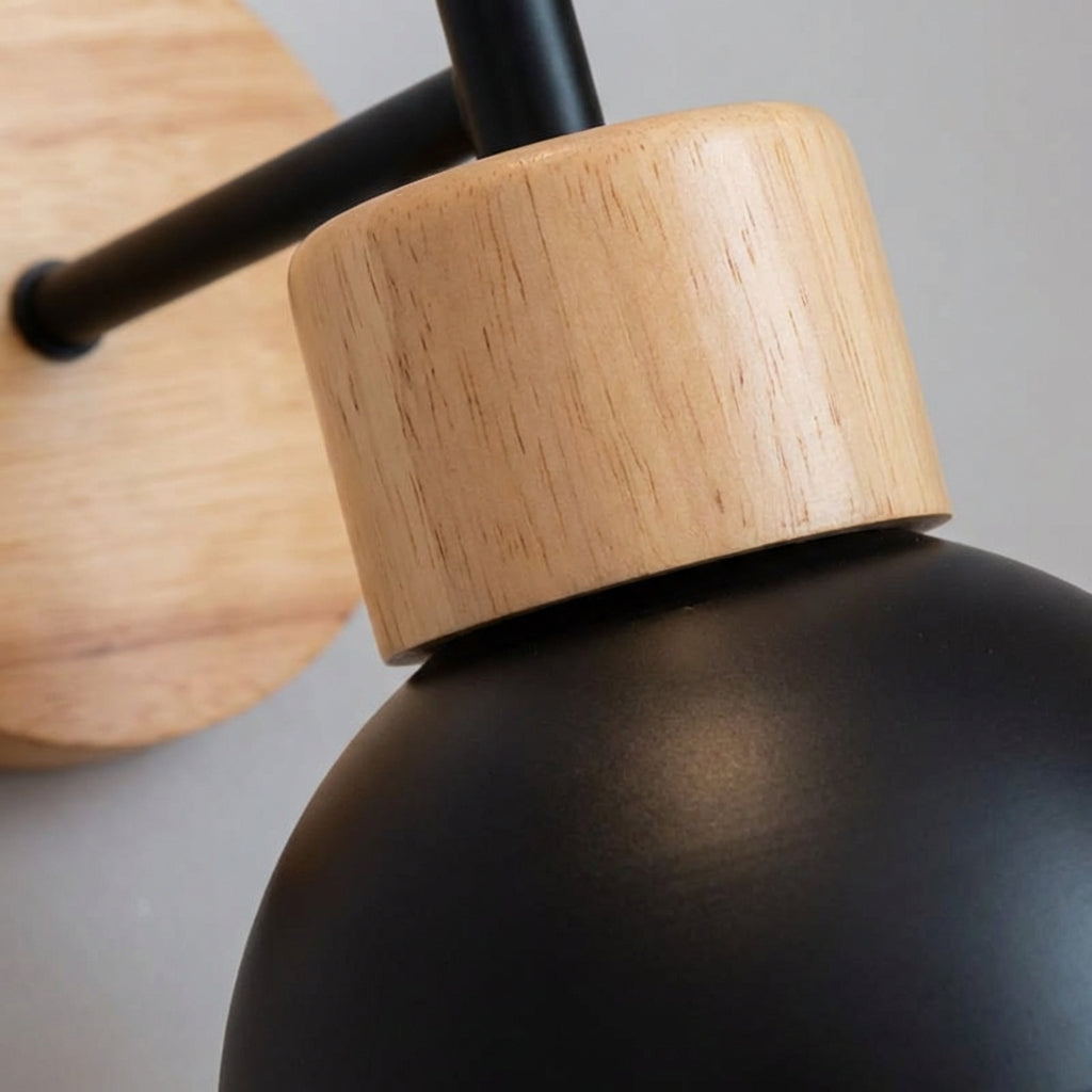 Modern minimalist LED wall sconce from Glowfowl, combining a clean light source with a stylish wood panel for decor.
