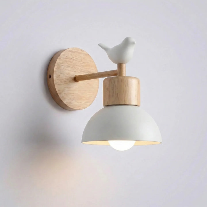 Sleek Glowfowl LED wall sconce, offering soft ambient light and a distinctive wood accent for modern decor.
