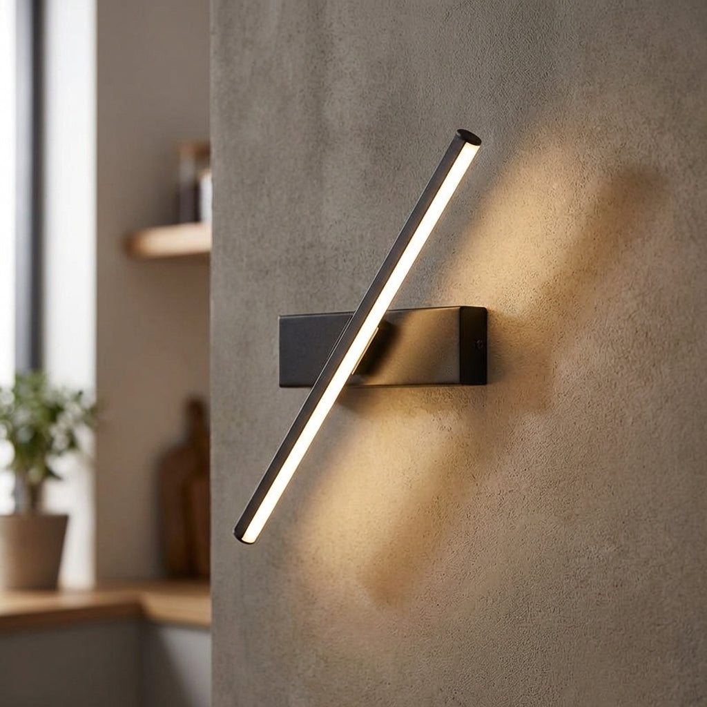Minimalist linear LED wall light, black finish, illuminating a modern living room