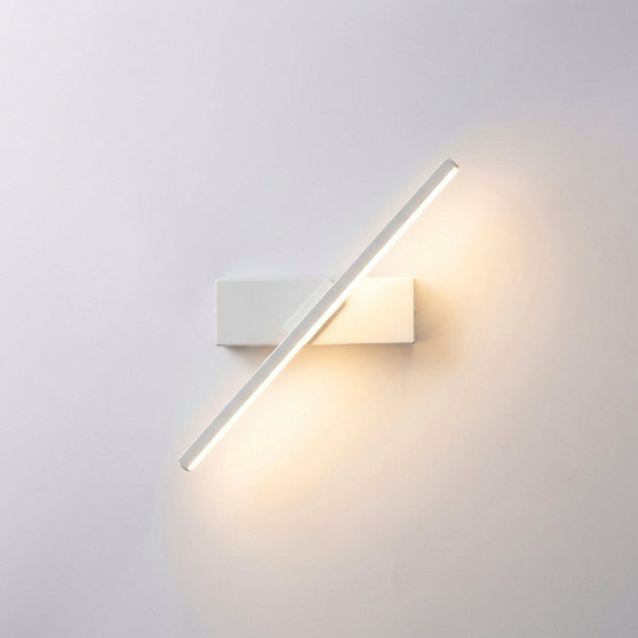Modern home lighting: a long, slim LED wall light brightening a hallway
