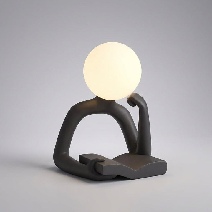 Figuray LED table lamp, minimalist and sculptural, USB powered, perfect for modern desks.