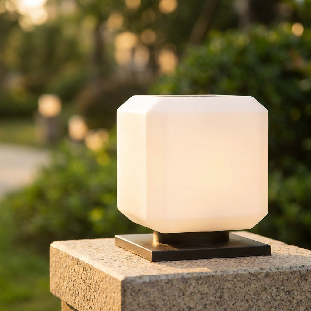 Minimalist Solar Cube Outdoor Lamp, Lumiqube light on a patio, eco-friendly garden lighting.