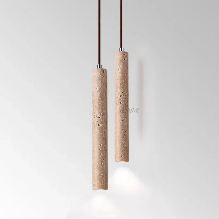 Minimalist travertine LED chandelier in wabi-sabi style. Perfect for modern dining rooms.