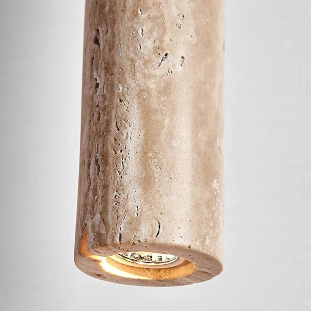 Modern dining room chandelier: minimalist LED, wabi-sabi travertine, contemporary long line fixture.