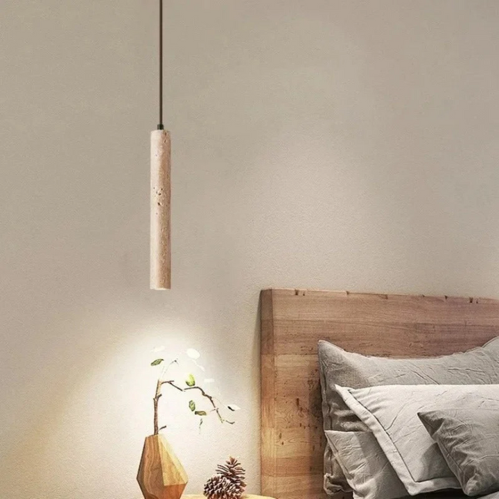 Textured natural travertine LED chandelier with a minimalist wabi-sabi style for modern interiors.
