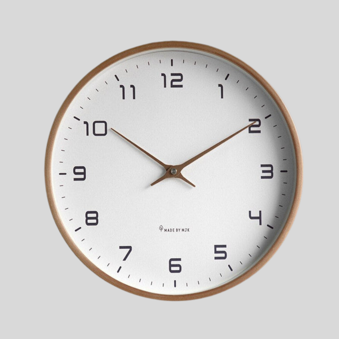 Minimalist wood wall clock with quiet quartz movement. Modern Scandinavian style home decor.