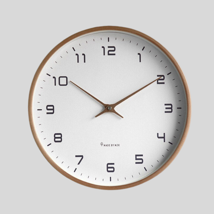 Minimalist wood wall clock with quiet quartz movement. Modern Scandinavian style home decor.