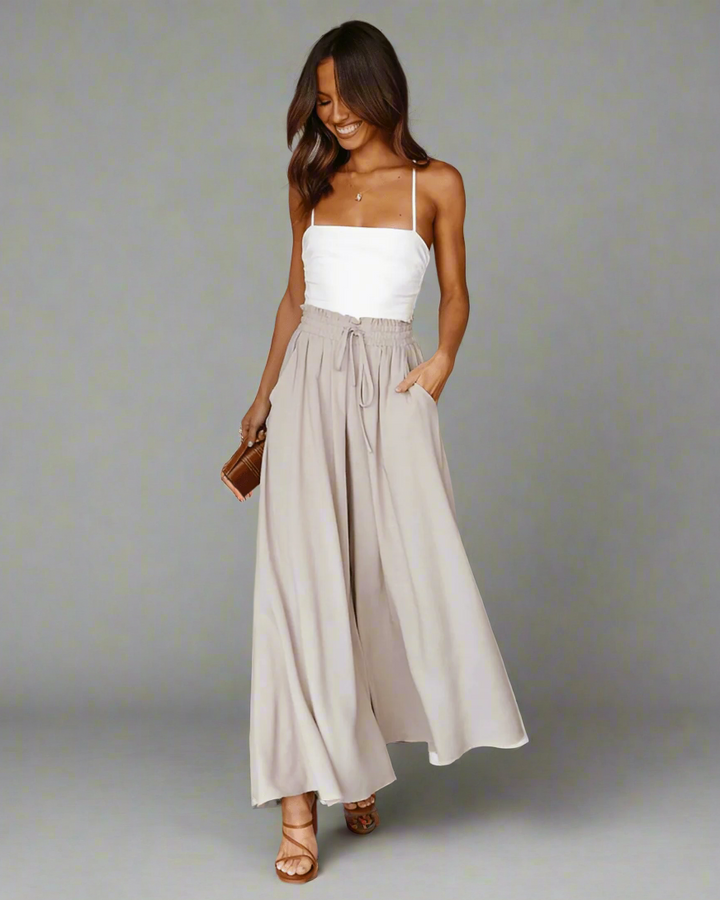 Close-up of the drawstring and high waist detail on Mira lightweight women's summer trousers.