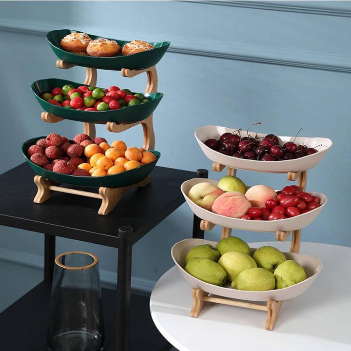 Modern 2-tier black metal fruit stand, perfect for kitchen counter organization and stylish produce display.
