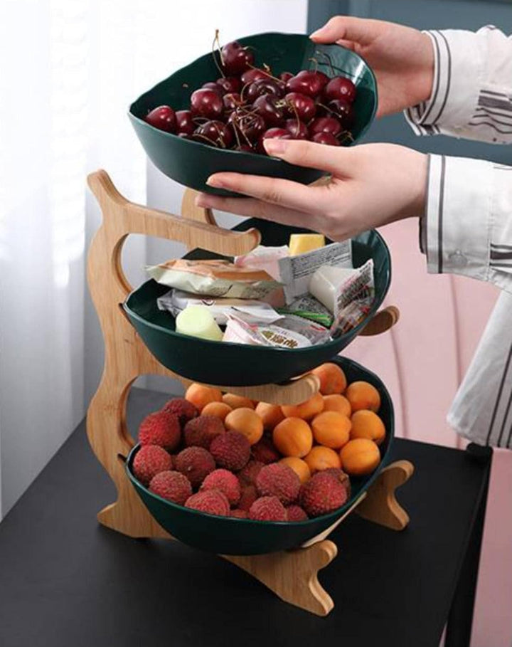 Black metal tiered fruit stand, a modern countertop display solution for fresh produce and kitchen organization.