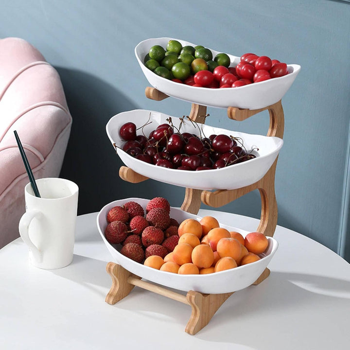 Space-saving 2-tier metal fruit stand, perfect for organizing fruits & veggies on your modern kitchen counter.