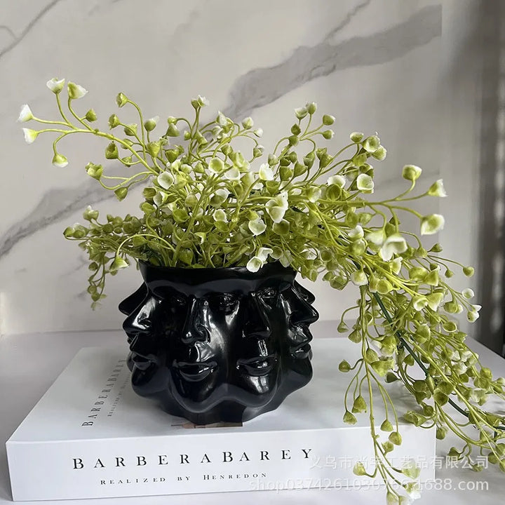 Artistic 'FaceBloom' 3D face planter. Modern sculptural plant pot, a unique home accent for any room.