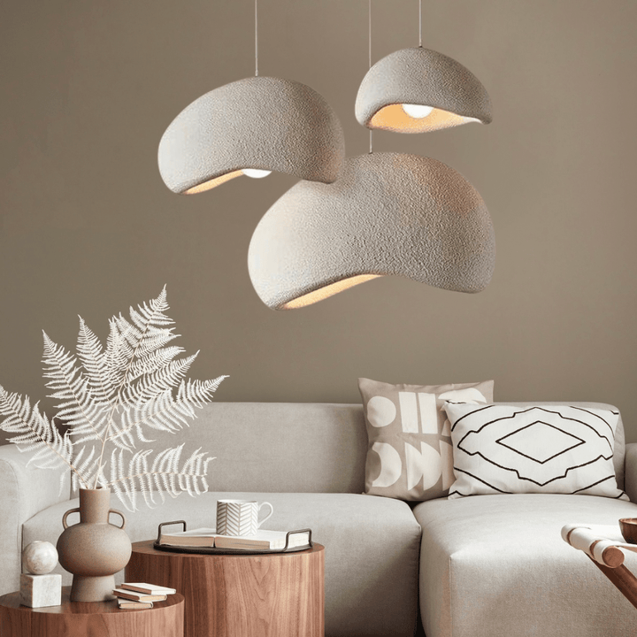 Contemporary LED ceiling pendant, adjustable height for modern home decor.
