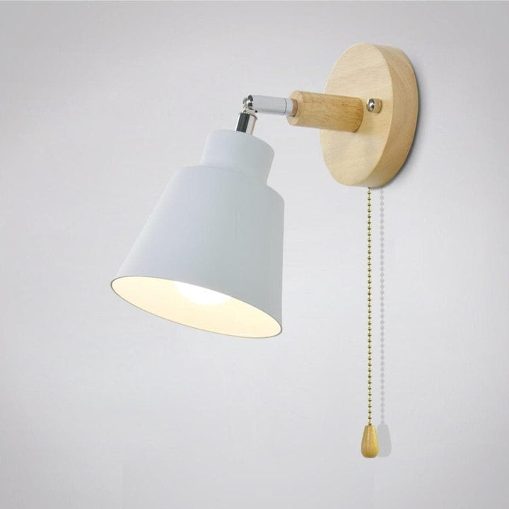 Modern adjustable wall lamp with a convenient pull switch, perfect for versatile indoor home lighting.